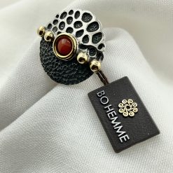 Zilveren ring uit de Bohemme collectie.Koraal gezet in 18 kt goud .