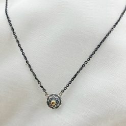 Donker gerhodineerd zilveren collier met kleine zilveren hanger