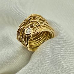 18 kt rosé gouden wikkel ring met ‘n briljant geslepen diamant