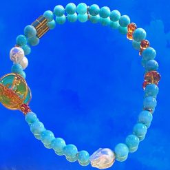 Collier Amazoniet , barnsteen en zoetwater parels.